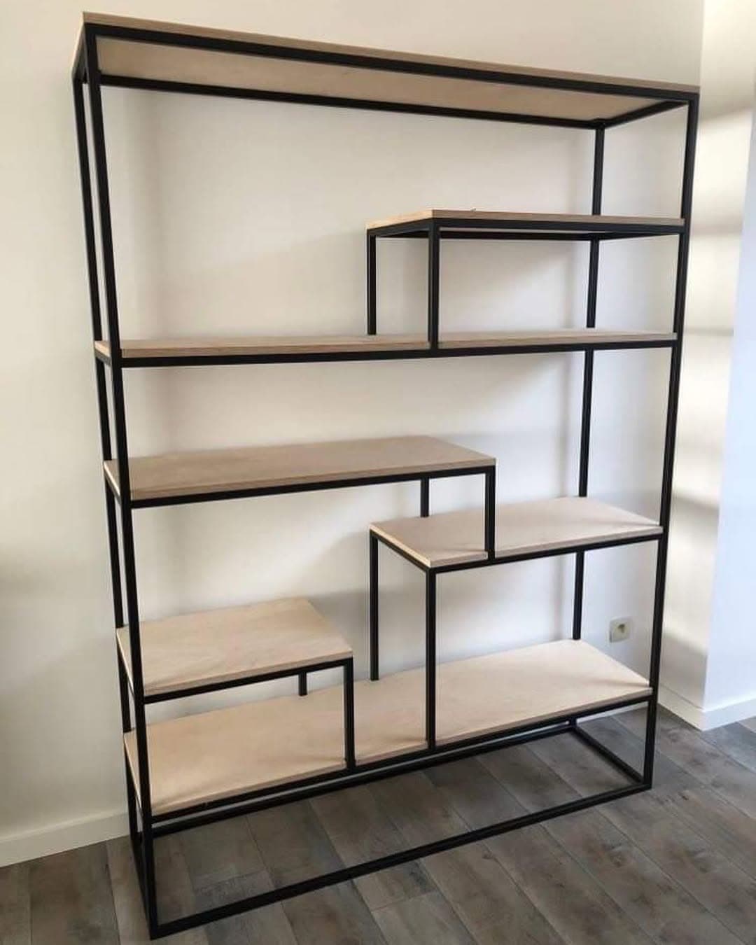 Asymmetric custom steel bookcase with wooden shelves