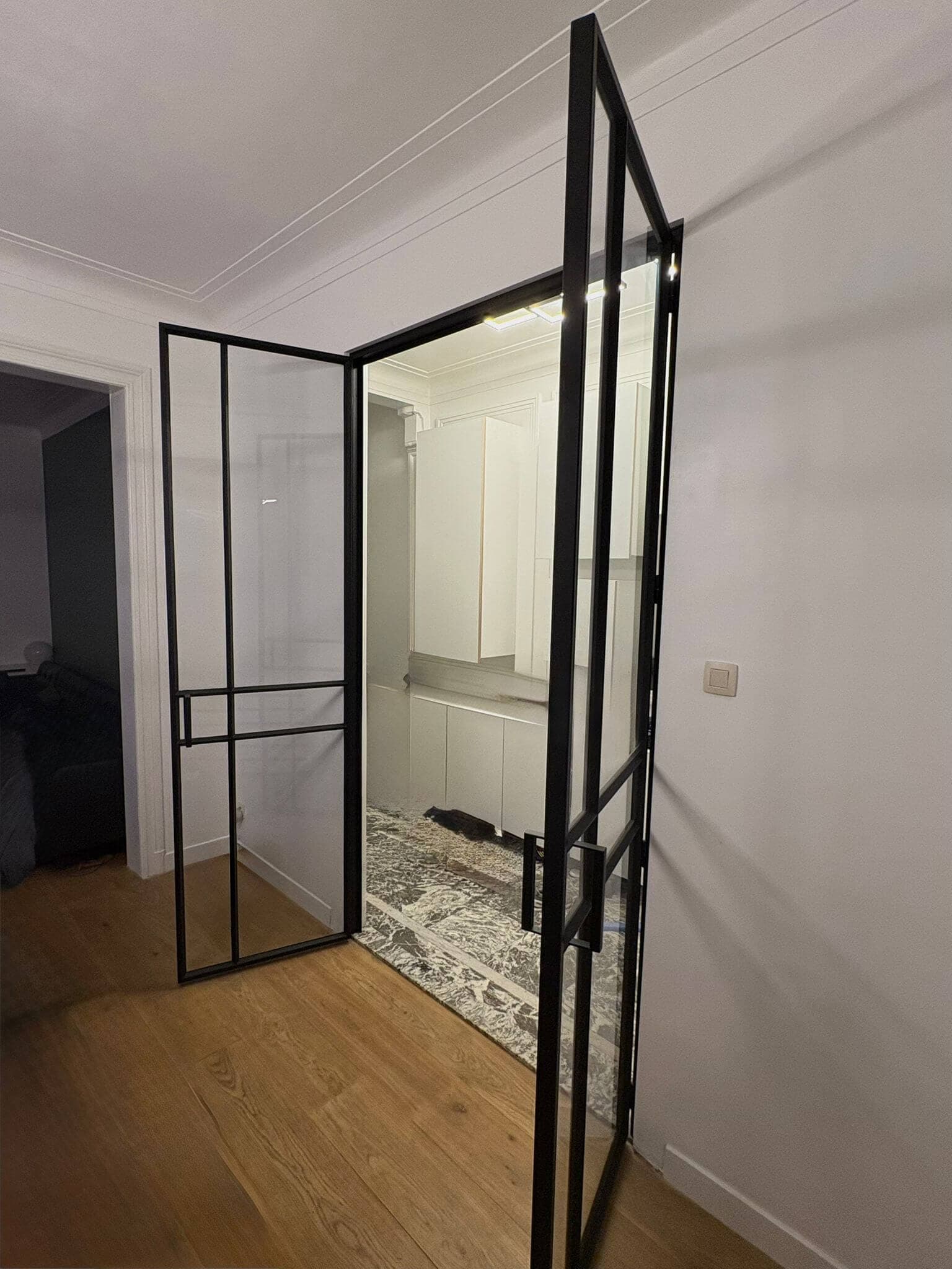 Custom steel-and-glass double doors by BSMetallic